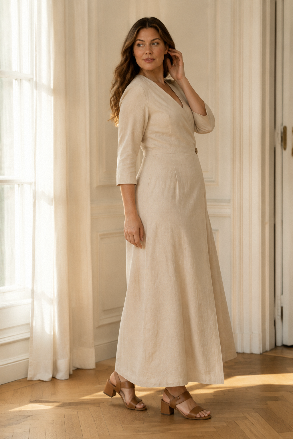 Beige linen wrap maxi dress, three-quarter view, wrap front and flowing linen skirt