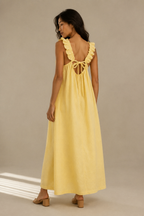 Butter yellow linen a-line maxi dress, back view, ruffled straps and delicate back ties