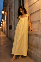 Butter yellow linen a-line maxi dress, front view, ruffled straps and flowing silhouette