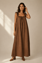 Brown linen a-line maxi dress, full front view, flowing maxi length and simple front neckline