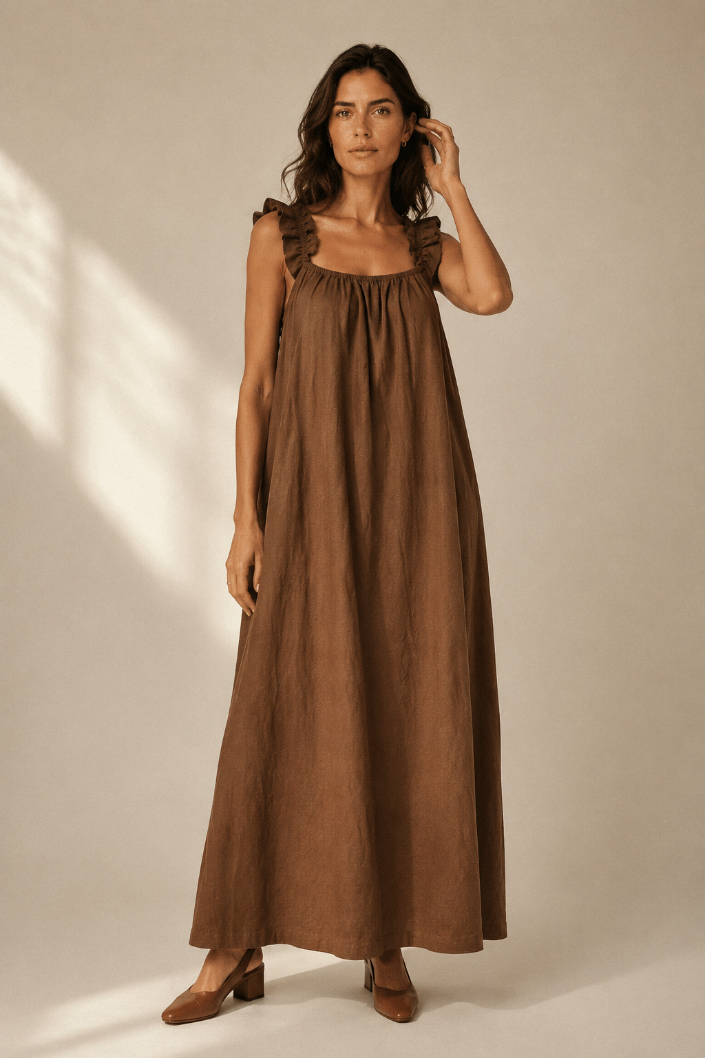 Brown linen a-line maxi dress, full front view, flowing maxi length and simple front neckline