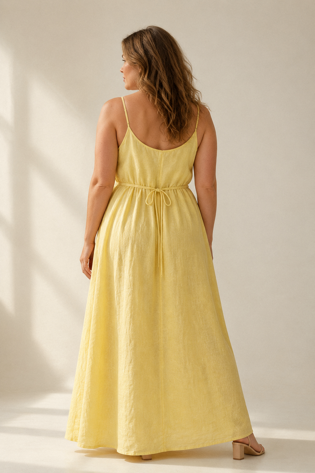 Butter yellow linen slip maxi dress, back view, simple back and smooth lines