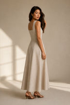 Beige linen a-line maxi dress, three-quarter view, natural linen drape
