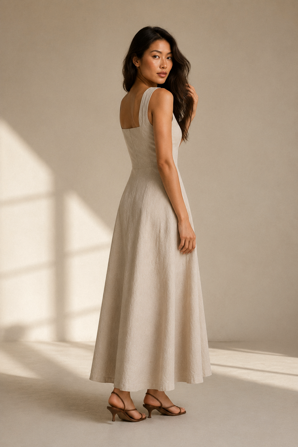 Beige linen a-line maxi dress, three-quarter view, natural linen drape