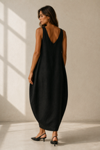 Black linen cocoon maxi dress, back view, relaxed drape and simple back