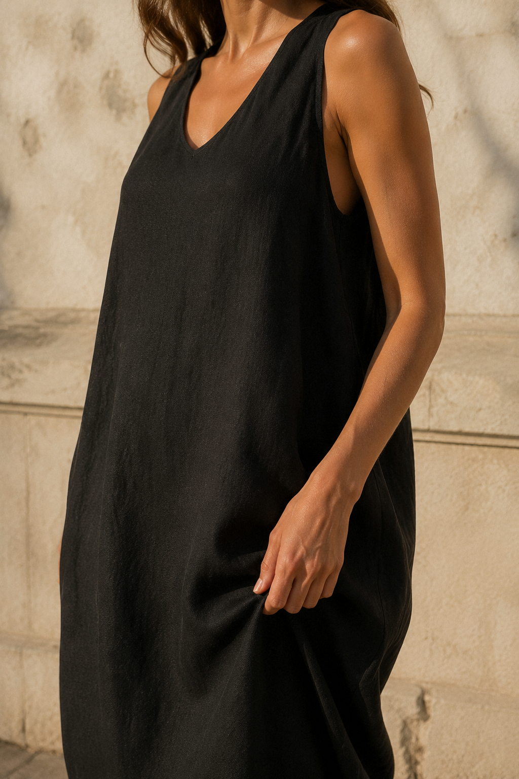 Black linen cocoon maxi dress, fabric detail, flax weave in raking light