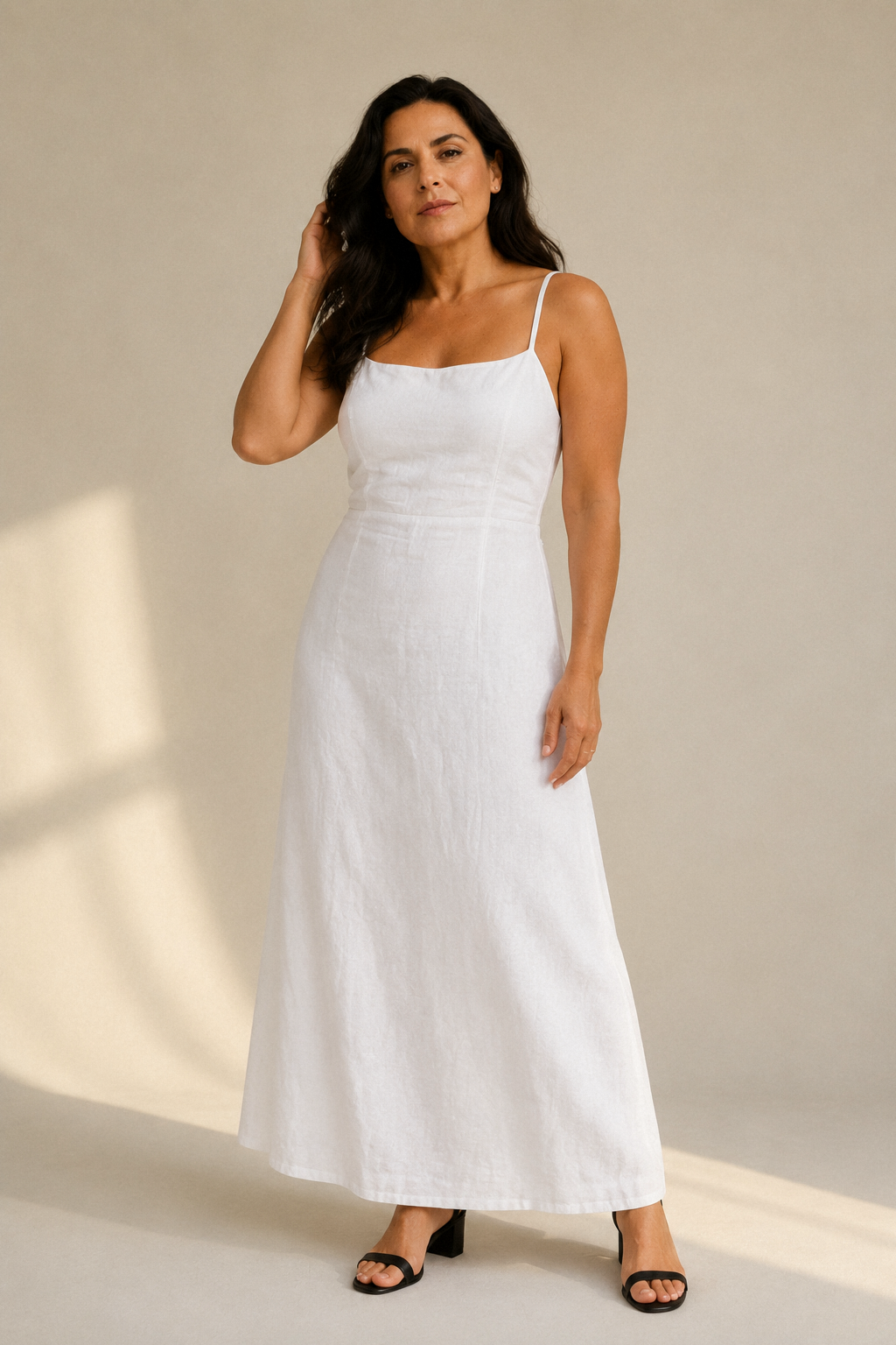 White linen a-line maxi dress, full front view, clean bodice and A-line skirt