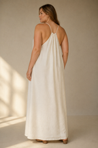 Ivory linen shift maxi dress, back view, gathered back detail and wide straps