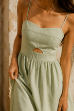 Light green linen a-line maxi dress, fabric detail, flax weave in raking light