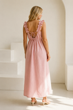Light pink linen shift maxi dress, back view, straight silhouette, simple lines