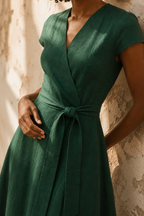 Emerald linen wrap midi dress, fabric detail, flax weave in raking light