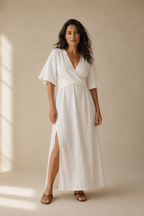 White linen wrap maxi dress, full front view, long skirt with side slit
