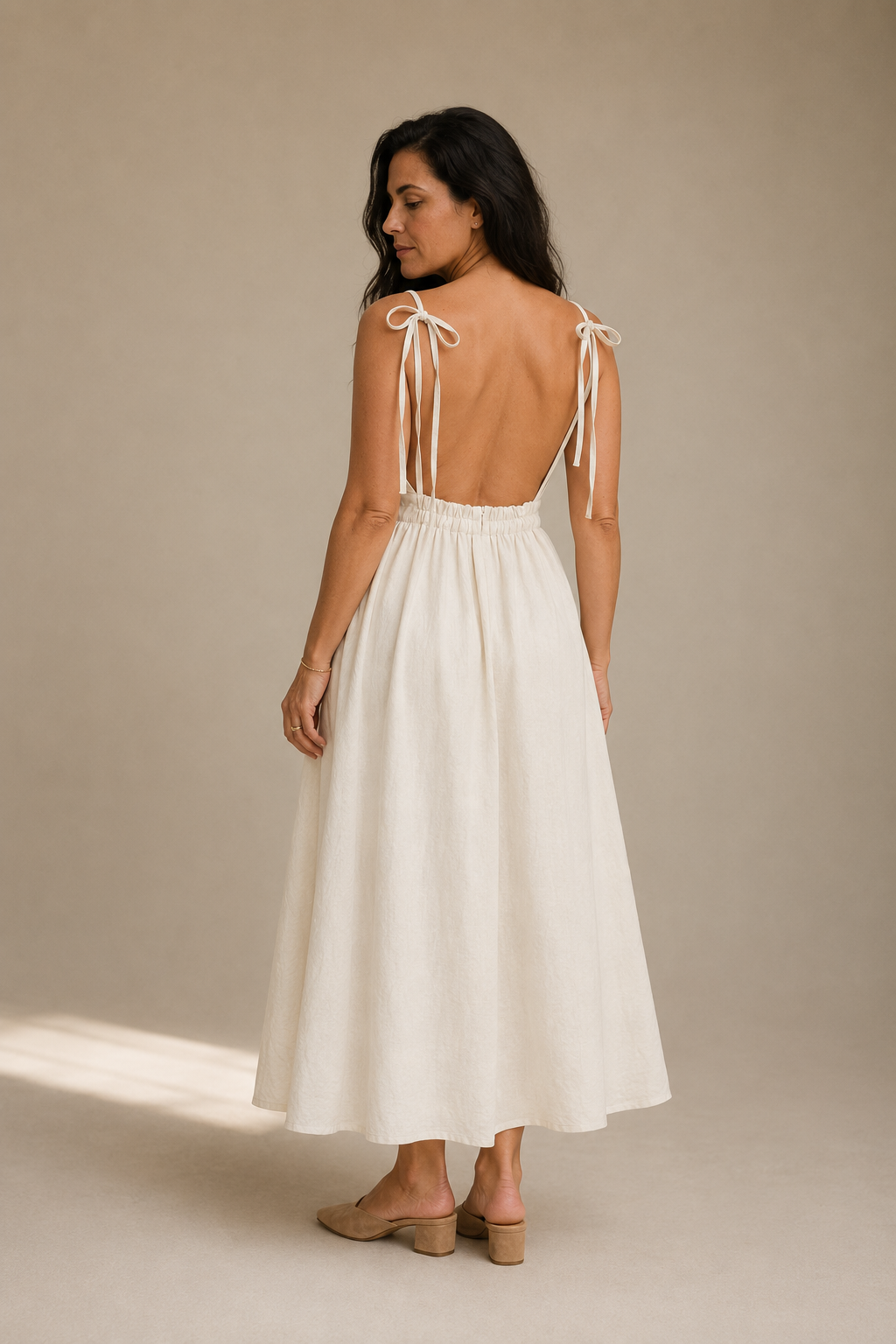 Ivory linen a-line midi dress, back view, deep open back and tie shoulder straps