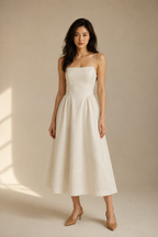 Ivory linen a-line midi dress, full front view, straight neckline and fitted bodice