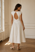 Ivory linen a-line midi dress, back view, fitted bodice, skirt release