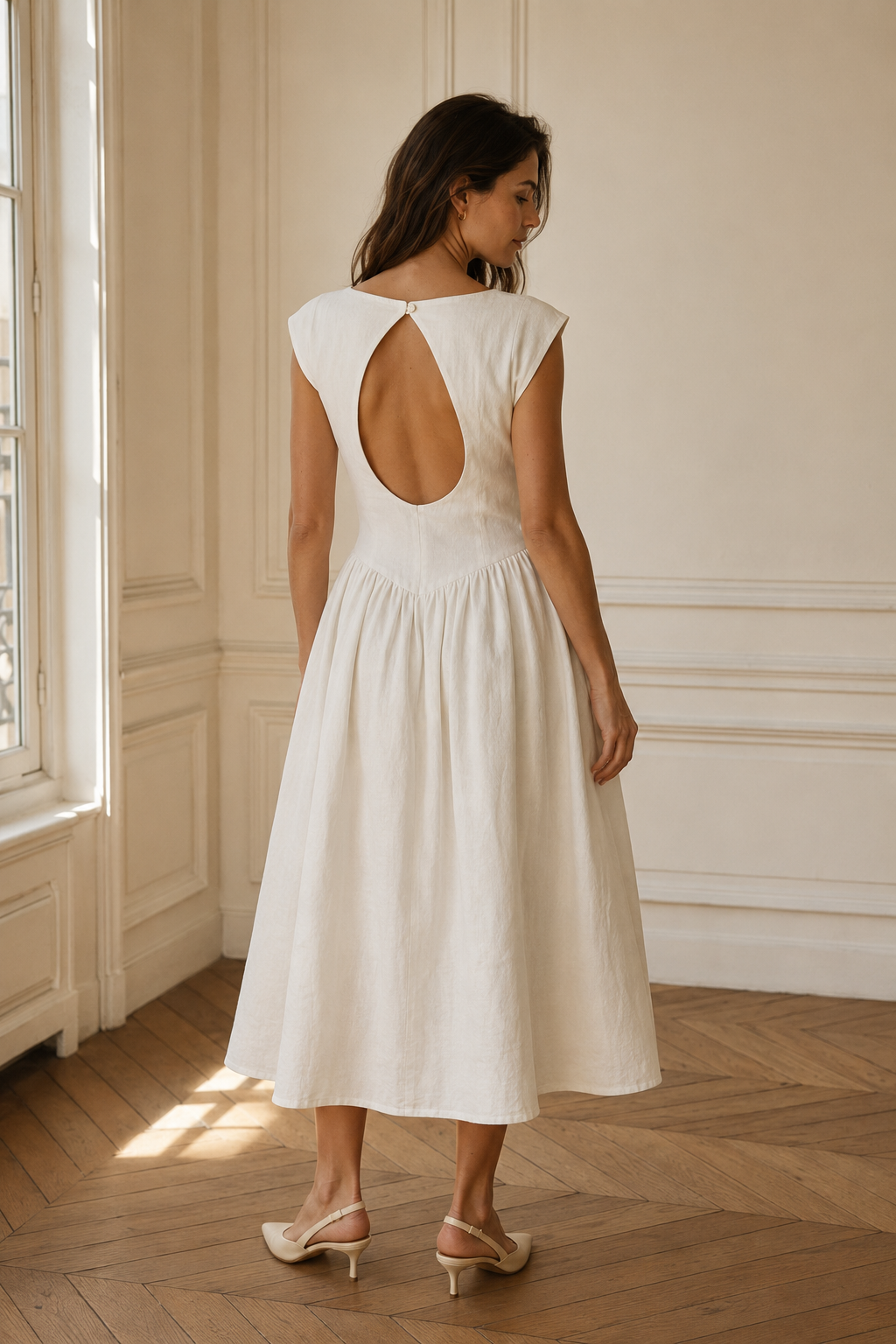 Ivory linen a-line midi dress, back view, fitted bodice, skirt release