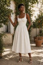 Ivory linen a-line midi dress, lifestyle, strolling in warm light