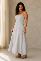 Light grey linen a-line midi dress, three-quarter view, a-line silhouette with natural fabric drape