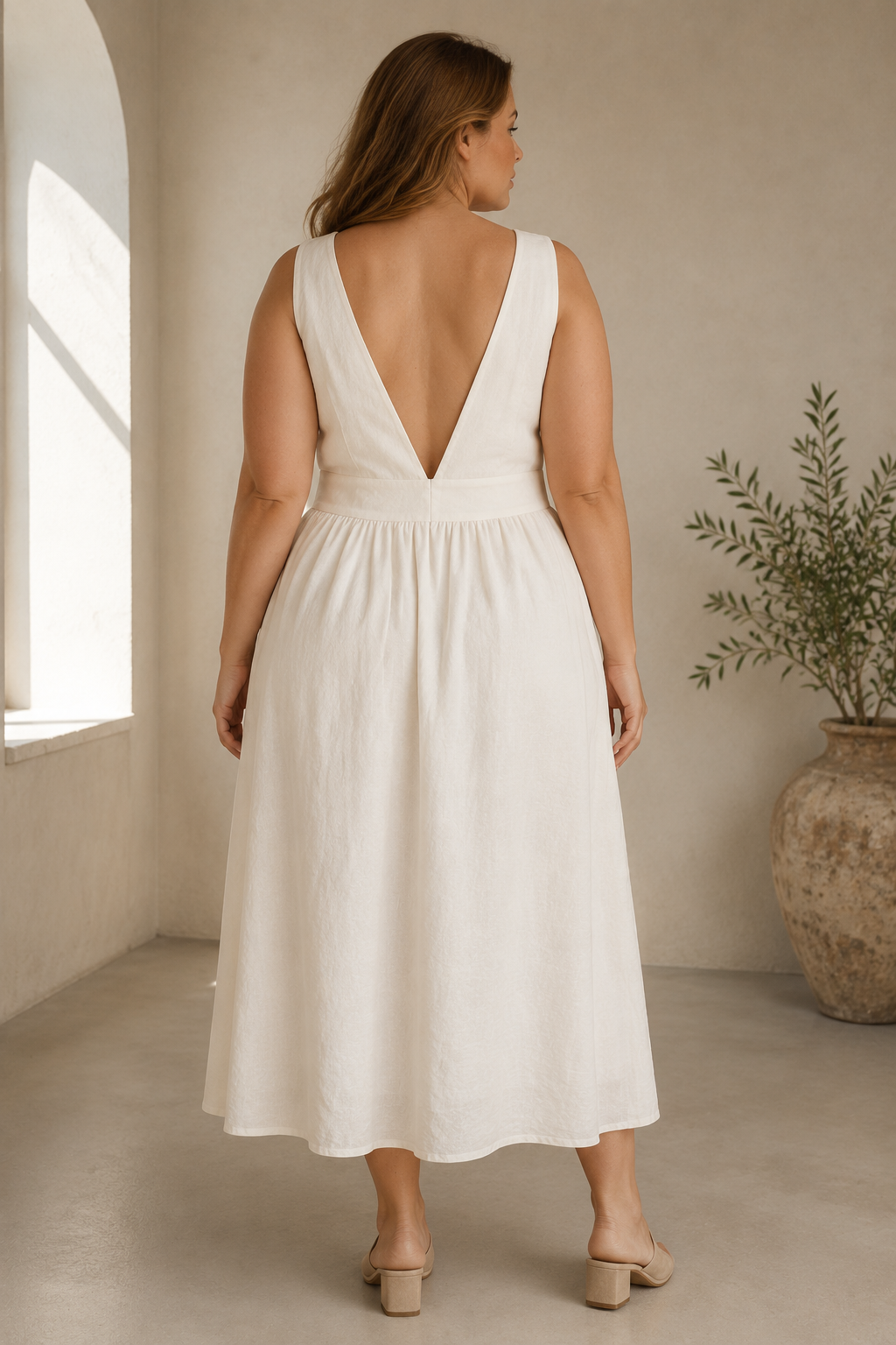 Ivory linen a-line midi dress, back view, fitted back and full skirt drape