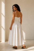 White linen a-line midi dress, back view, square back and gentle drape