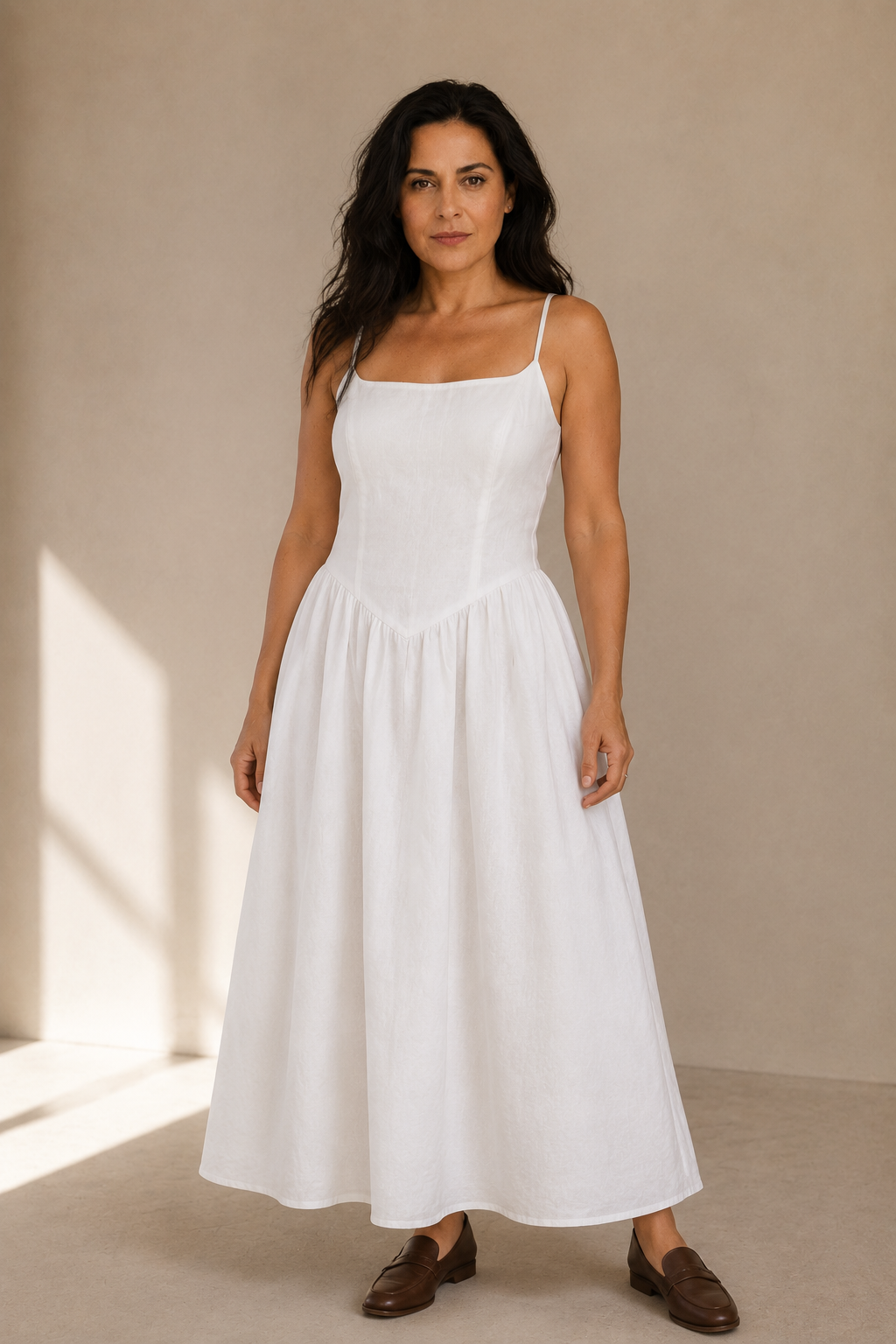White linen a-line midi dress, full front view, fitted bodice and A-line skirt