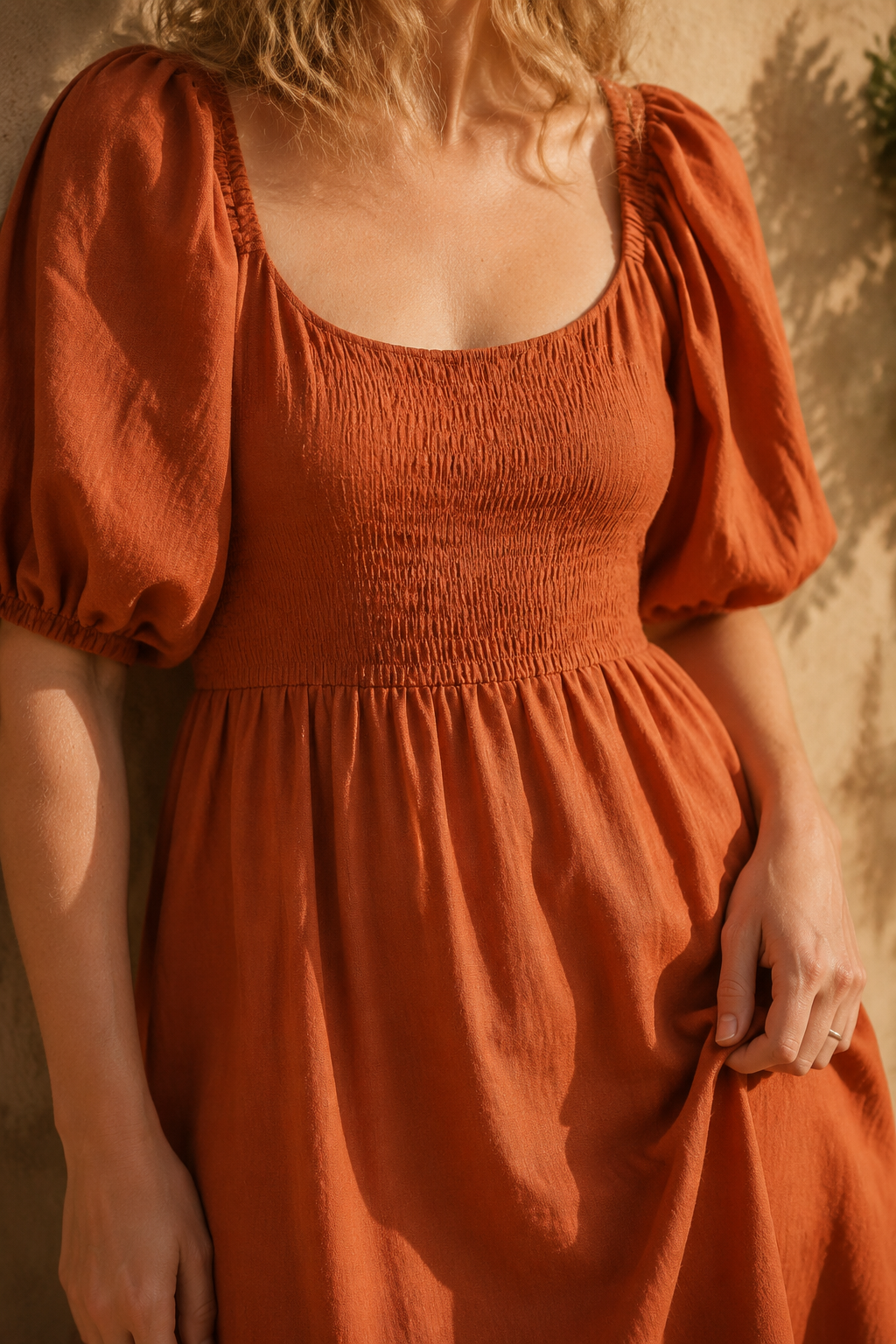 Rust orange linen a-line midi dress, fabric detail, flax weave in raking light