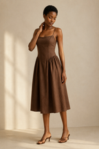 Brown linen a-line midi dress, three-quarter view, flowing midi skirt and natural drape