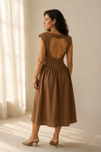 Brown linen a-line midi dress, back view, heart-shaped back cut-out and gathered waist