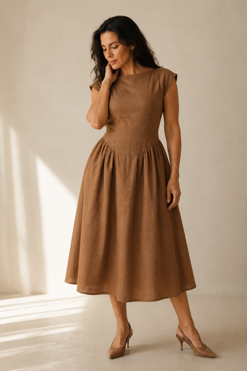 Brown linen a-line midi dress, three-quarter view, cap sleeves and full skirt volume