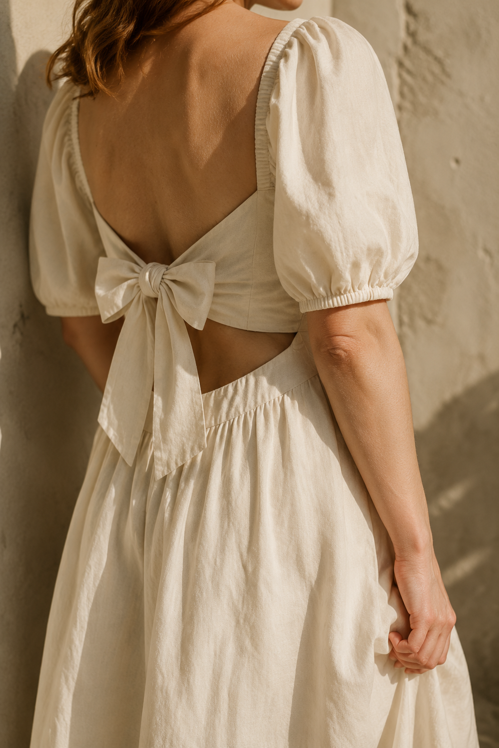 Ivory linen a-line midi dress, fabric detail, flax weave in raking light
