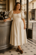 Ivory linen a-line midi dress, lifestyle, sunlit afternoon stroll