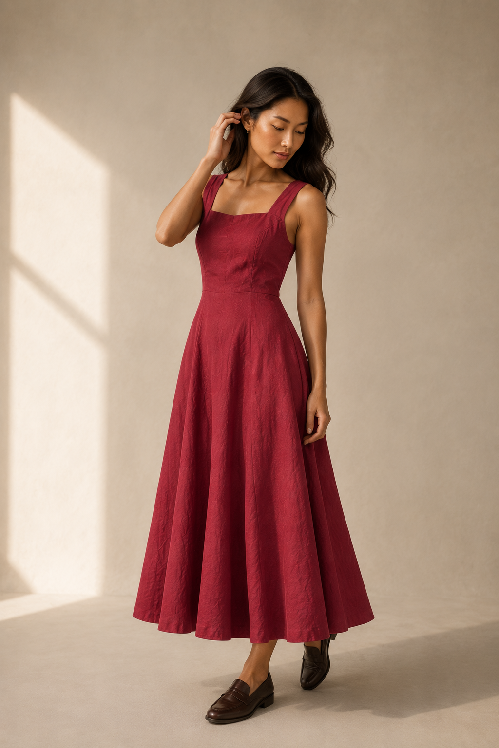 Red linen a-line midi dress, three-quarter view, textured fabric and flowing skirt