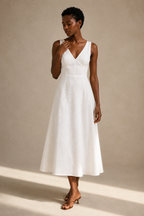 White linen a-line midi dress, full front view, fitted bodice, flowing A-line skirt