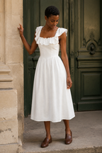 White linen a-line midi dress, front view, square neckline and ruffled cap sleeves