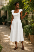 White linen a-line midi dress, lifestyle, afternoon light and gentle movement