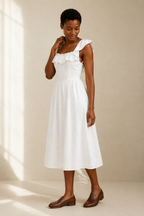 White linen a-line midi dress, three-quarter view, gathered waist seam and soft skirt drape