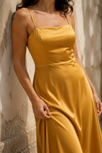 Golden yellow silk slip midi dress, fabric detail, soft sheen in raking light