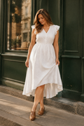 White linen a-line midi dress, front view, V neckline and ruffle sleeves