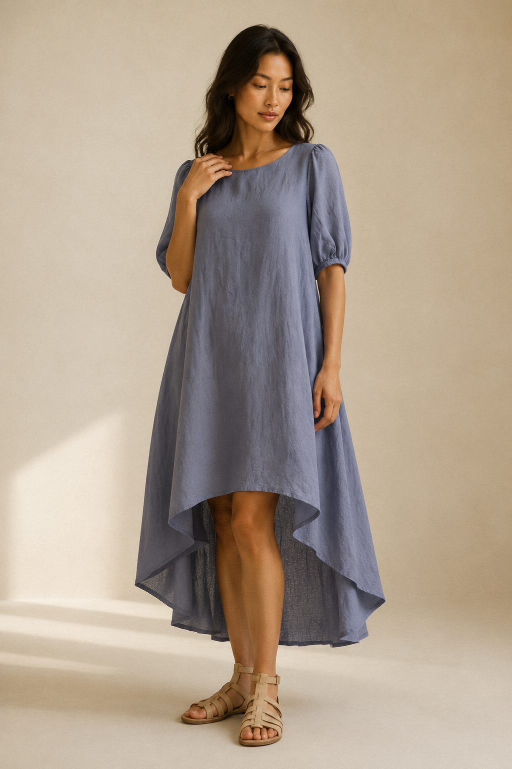 Blue-grey linen shift midi dress, full front view, relaxed silhouette, round neckline, puff sleeves