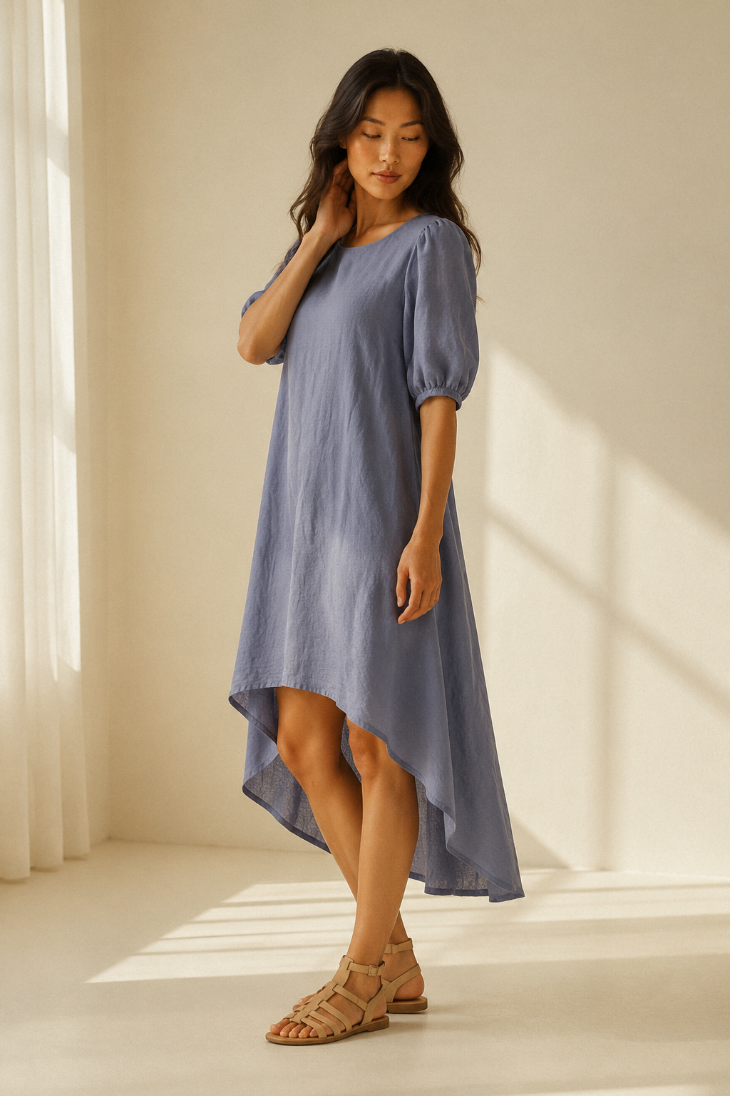 Blue-grey linen shift midi dress, three-quarter view, flowing skirt, natural linen texture