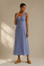 Dusty blue linen a-line midi dress, full front view, sleeveless bodice and flowing skirt