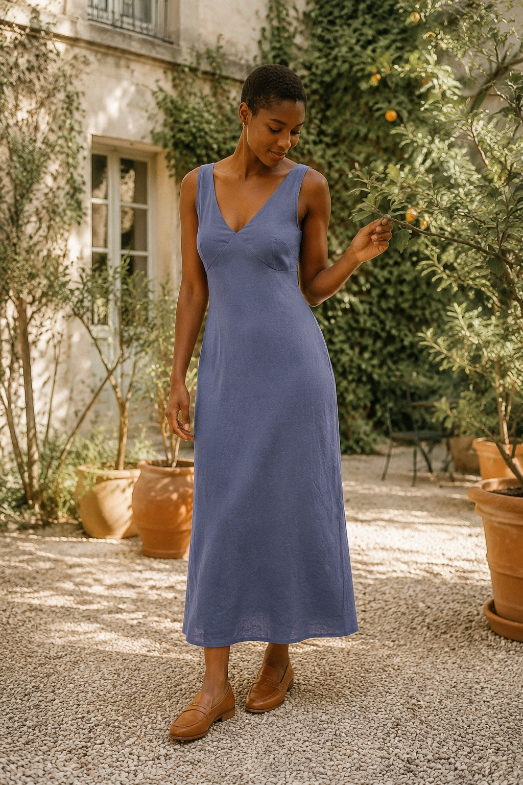 Dusty blue linen a-line midi dress, front view, v-neck back and A-line skirt