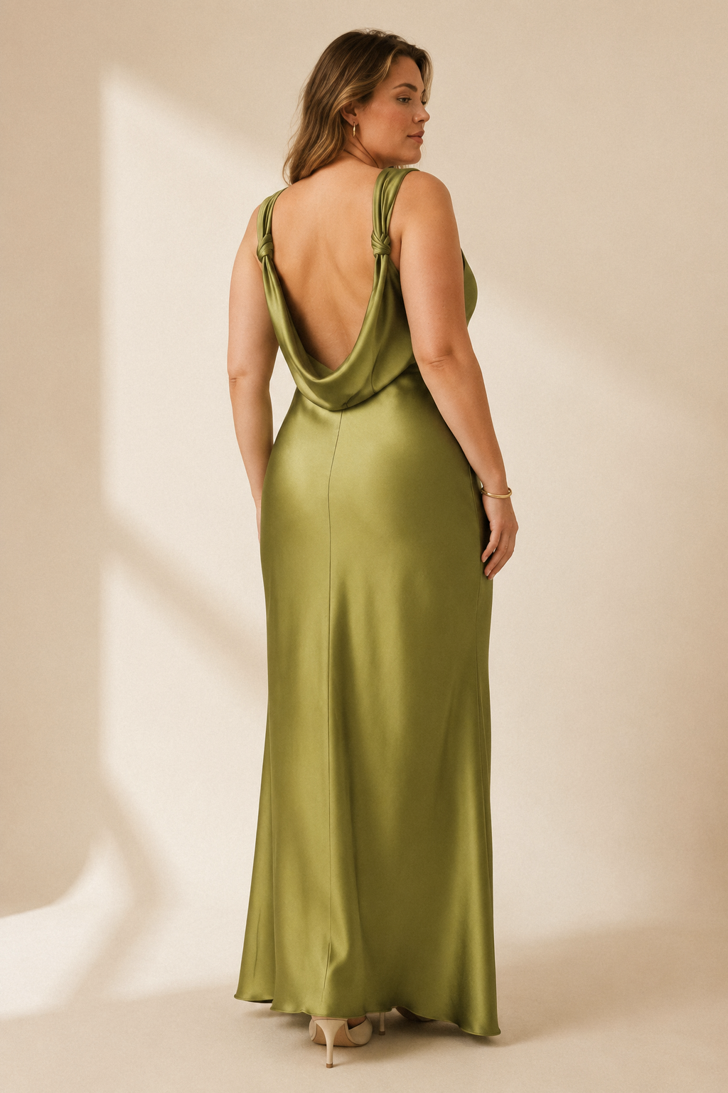 Olive green silk column midi dress, back view, smooth back silhouette