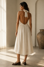 Ivory linen a-line midi dress, back view, halter tie detail at the neck