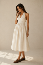 Ivory linen a-line midi dress, three-quarter view, skirt's full drape and movement