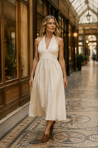 Ivory linen a-line midi dress, lifestyle, garden stroll in soft light