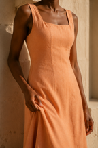 Peach linen a-line midi dress, fabric detail, flax weave in raking light