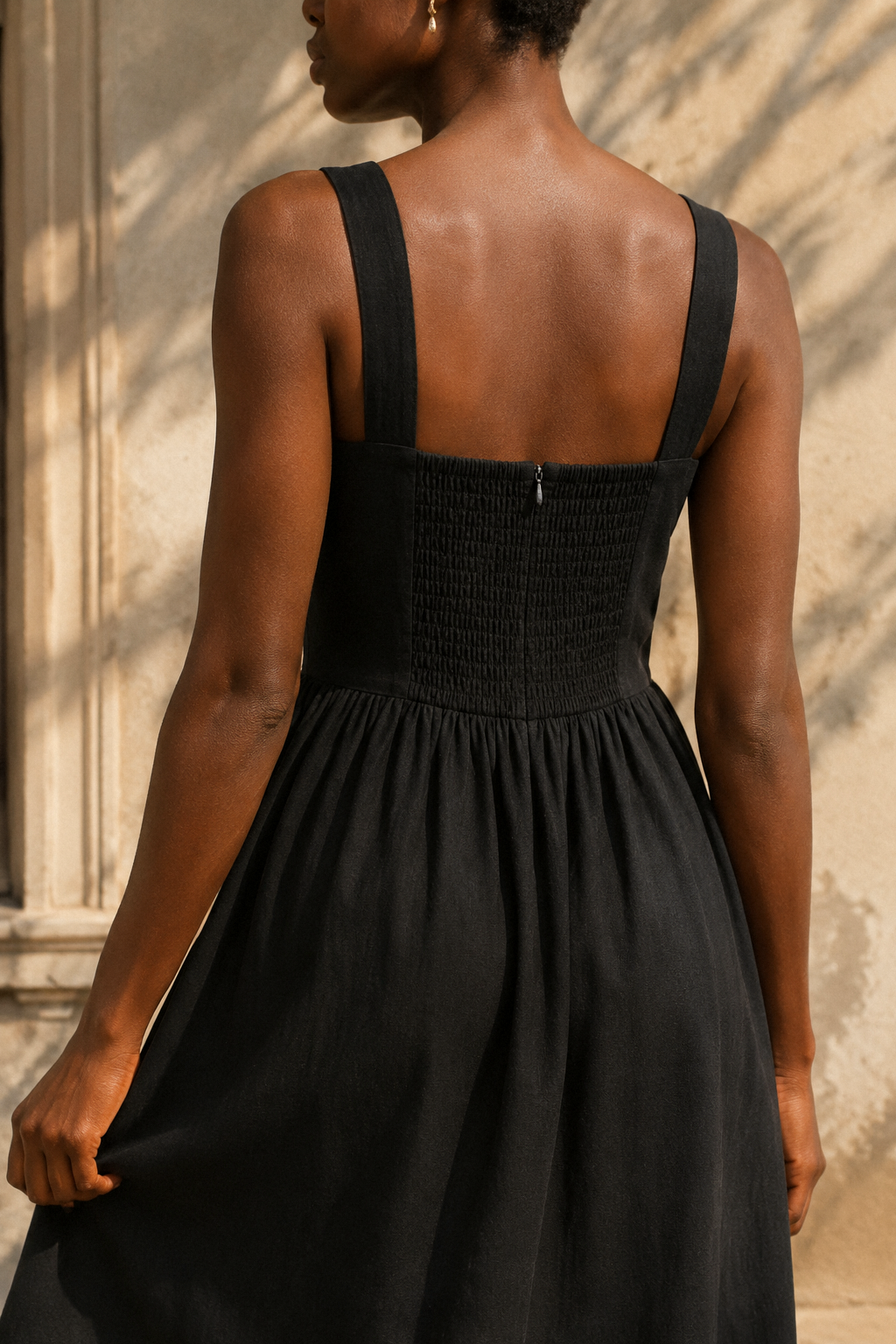 Black linen a-line midi dress, fabric detail, flax weave in raking light