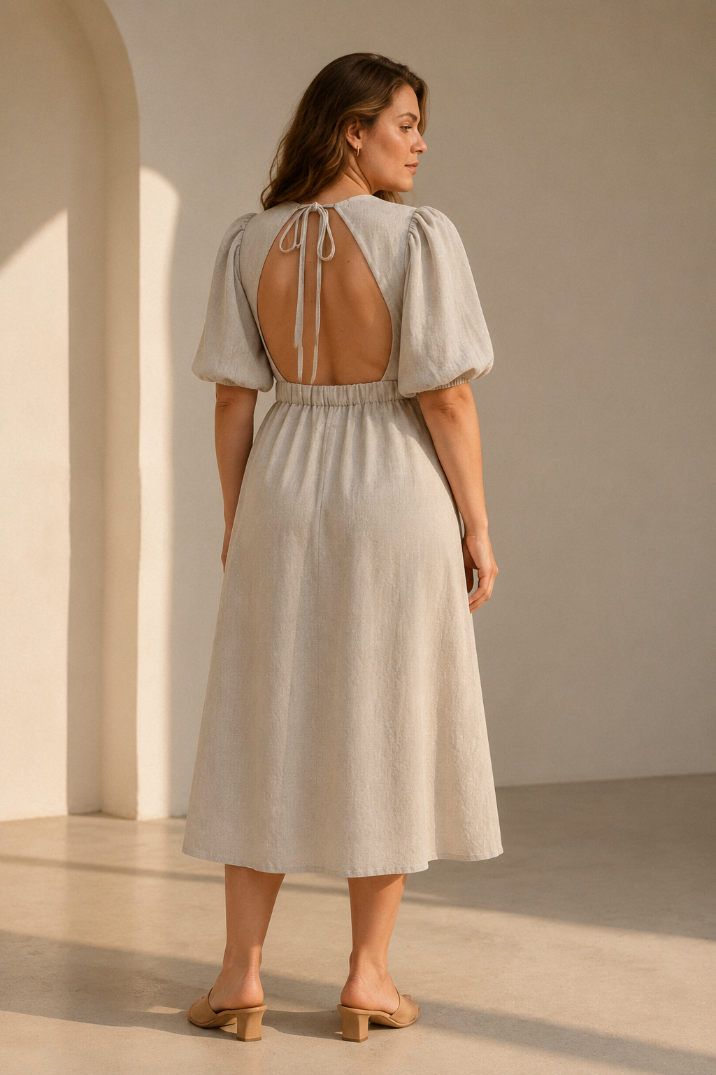 Beige linen a-line midi dress, back view, open back with tie closure
