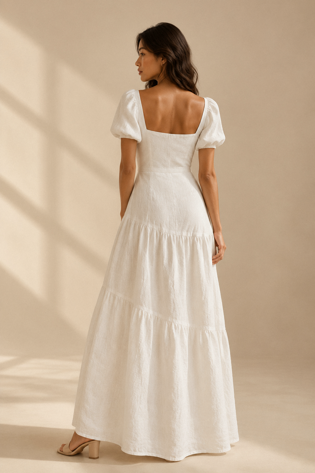Ivory linen fit-and-flare midi dress, back view, fitted bodice and skirt release